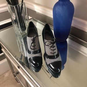 Black patent/herringbone heels. NWOT no box.